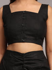 Square-neck black crop top with front buttons and ruched high-waist pants